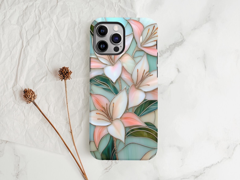 Stargazer lily stained glass phone case with blush pink flowers, green leaves, and teal faux glass background, printed flat with a 3D look.
