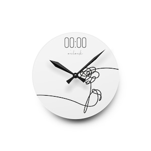 May include: White round clock with black hands and a black line drawing of a flower. The clock face reads "00:00 o'clock".