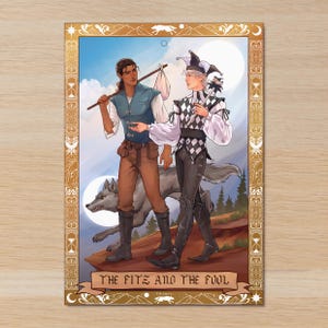 May include: An illustrated tarot card featuring two figures in fantasy attire, framed in gold. One figure carries a pack and staff, the other wears a harlequin outfit. A wolf walks beside them. The text "THE FITZ AND THE FOOL" is at the bottom.