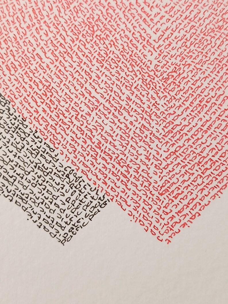 detail of twee gearts written wirh names, one heart in black and one in red.