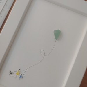 Sea glass | person with a ballooon and a dog | Framed | wall decoration | Handmade | Authentic Art | Gift | Framed size: 13 x 18 cm
