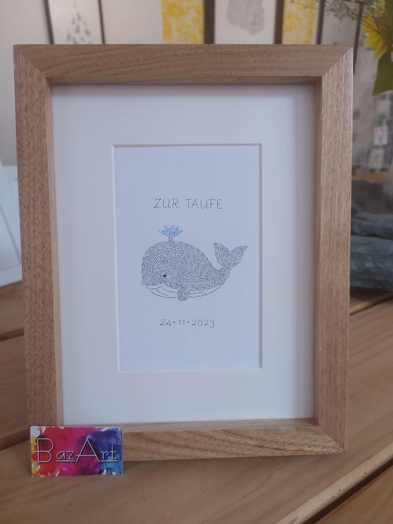 Front view of an image of a baby whale. The complete image consists entirely of handwritten words. In this image the words are hundreds of times the name of the newborn baby.
Under the baby whale is written the date of the baptism.