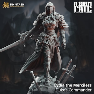 May include: A gray 3D printed miniature of a female warrior in full armor, holding a sword. She is standing on a rocky base with two swords lying on the ground. The text "Lydia the Merciless Duke's Commander" is below the figure.