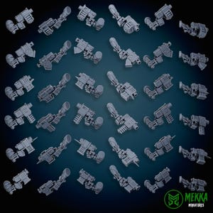 May include: A set of 24 grey plastic miniature weapon arms for tabletop gaming. The arms are posed in various positions, holding different types of weapons.