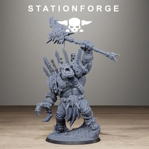 May include: A gray resin miniature figure of an orc warrior standing on a circular base. The figure holds a large spiked mace overhead with one hand and features a mechanical claw on the other arm. The text STATIONFORGE appears above the figure.