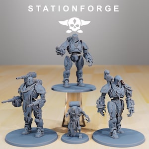 May include: Four gray plastic miniature robots, two standing on circular bases, one standing on a square base, and one standing on a rectangular base. The robots are all in different poses and have different weapons. The robots are all part of a tabletop game.