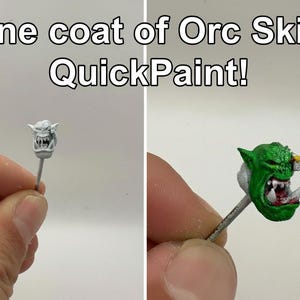 May include: Image shows a miniature Orc head before and after painting. The text "One coat of Orc Skin QuickPaint!" is displayed above the miniatures. The painted head is green with red and white details.