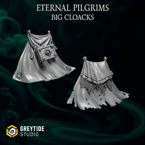 May include: Two 3D printed plastic cloaks for miniature figures. One cloak is plain and the other has a chainmail trim. The text "Eternal Pilgrims Big Cloacks" is at the top of the image.
