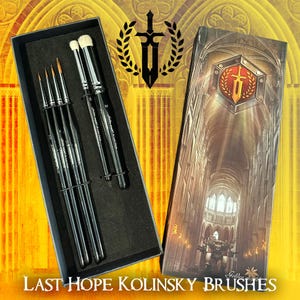 May include: A set of Last Hope Kolinsky brushes in a black box, with a matching box featuring a cathedral illustration. The brushes have black handles and silver accents. The text "Last Hope Kolinsky Brushes" is displayed at the bottom.