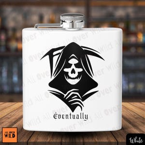 May include: White hip flask featuring a black Grim Reaper illustration with a skull and the word "Eventually". It has a silver cap and hinge. The brand name "All Over Wild" is in the bottom left corner.