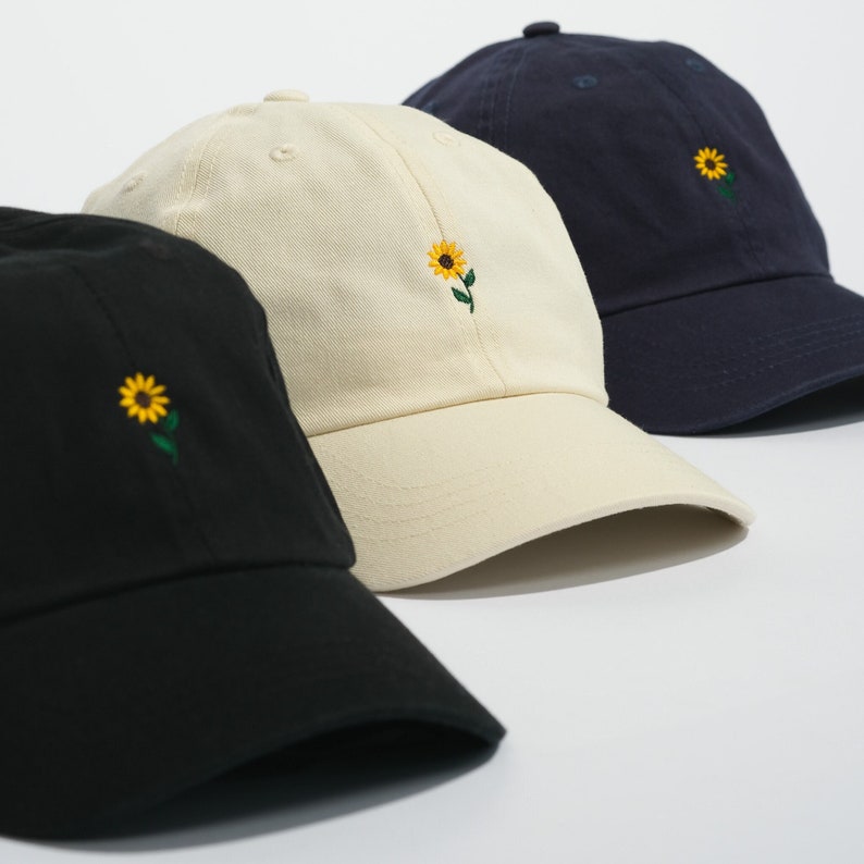 Custom embroidered UK caps with Sunflower design on the front