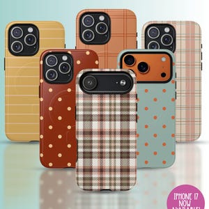 May include: A collection of iPhone 17 phone cases in various patterns. Designs include vertical stripes, plaid, polka dots, and a grid pattern. The cases feature a range of colors, including orange, brown, and teal. The text "iPhone 17 Now Available!" is visible.