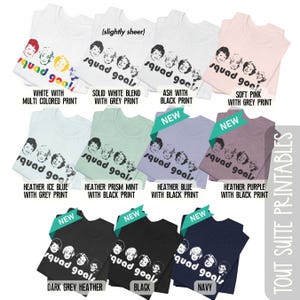 May include: A selection of t-shirts in various colours, each displaying a graphic of faces and the text "squad goals." Colours include white, pink, blue, purple, and black. Some shirts have multi-coloured or grey prints.
