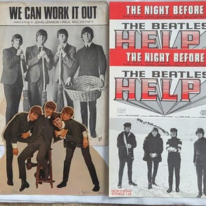 May include: A collection of vintage Beatles sheet music. One cover reads "We Can Work It Out", the other "Help!". The covers feature black and white photographs of the band. The text "The Night Before" is also visible on the covers.