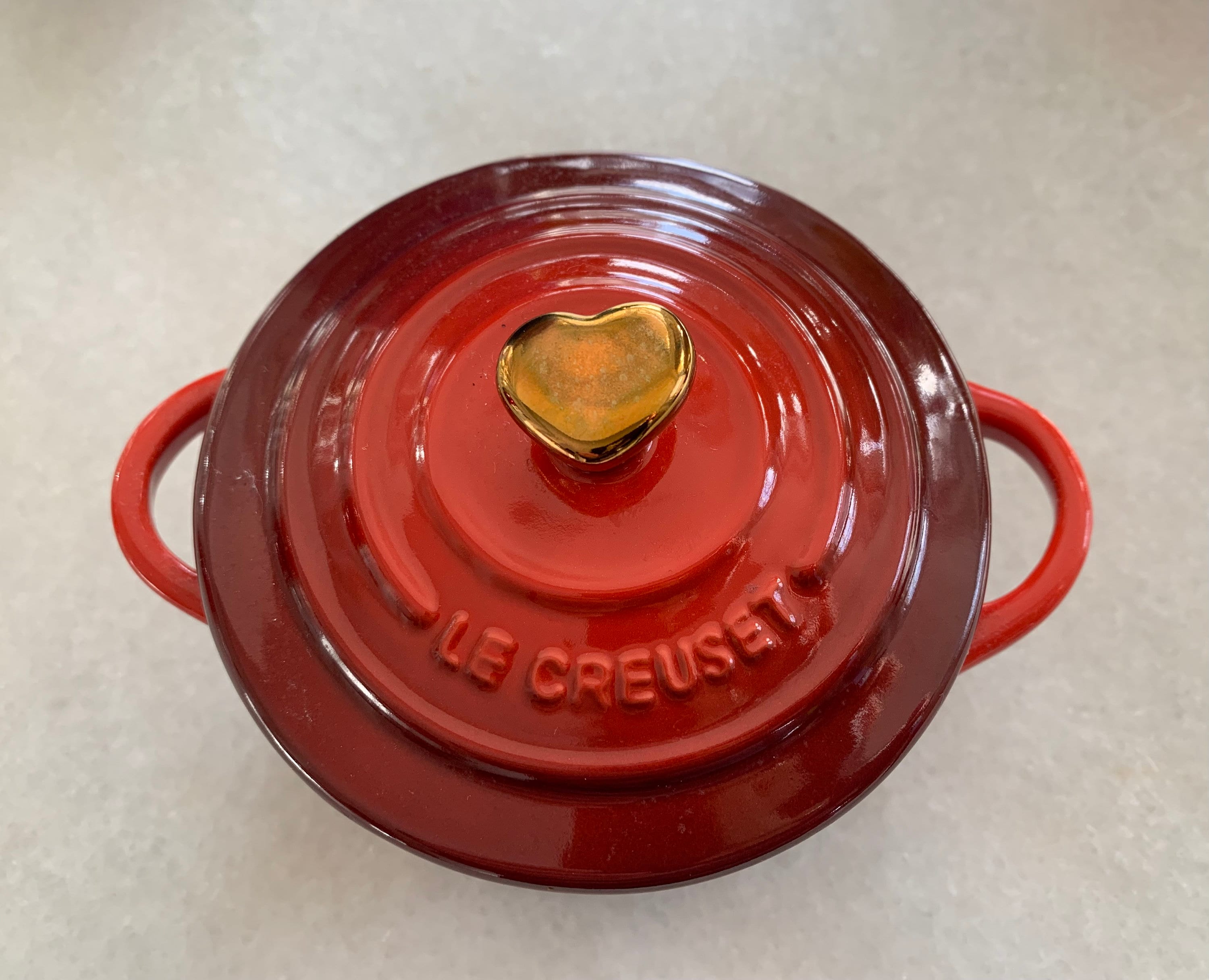 Restaurantware 9 Ounce Mini Casserole Dish, 1 Mini Dutch Oven with Lid - Enameled, Oval, Red Cast Iron Mini Cocotte, Heavy-Duty, for Baking