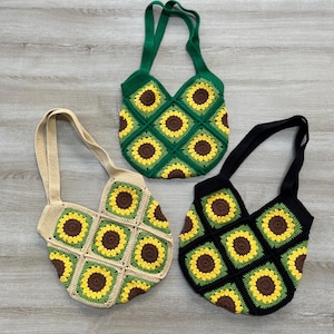 May include: Three crocheted tote bags with sunflower designs. The bags are in green, black, and beige.