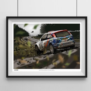 May include: A white Ford Focus rally car with blue and orange accents, driving on a winding road through a forest. The car has the number "4" on the side and the word "Mobil" on the hood. The car is covered in dirt and mud.