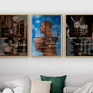 May include: Three album covers for Drake's albums. The first album cover is for "Take Care" and features a photo of Drake in a room with a painting behind him. The second album cover is for "Nothing Was The Same" and features a photo of Drake against a blue sky with clouds. The third album cover is for "For All The Dogs" and features a black and white illustration of a dog. Each album cover has the album title, Drake's name, and the album release date.