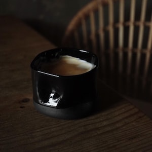 Wobbly ceramic cup  | Black stoneware clay | Glossy black color | Handmade cup without handles | Nice gift for a friend