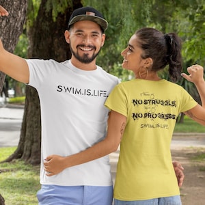 May include: A white t-shirt with the text "SWIM.IS.LIFE" and a yellow t-shirt with the text "NO STRUGGLE, NO PROGRESS SWIM.IS.LIFE". The image shows two people wearing the shirts.
