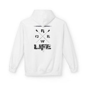 May include: White hoodie with a hood and long sleeves. The back of the hoodie features the words "CREW LIFE" in a distressed, black font, with crossed oars. The hoodie is a casual garment.
