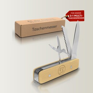 Può includere: Un coltello multiuso in legno chiaro con diverse lame e strumenti in acciaio inossidabile, tra cui un coltello, una sega e forbici. L'impugnatura presenta un logo di elefante. Sono visibili anche una scatola di cartone e un'etichetta rossa con testo tedesco.