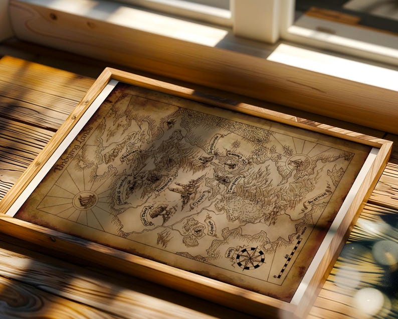 May include: A framed map with a vintage aesthetic. The map, in shades of brown, features detailed illustrations of landmasses, mountains, and sea creatures. The frame is made of light-coloured wood. The map is titled "Undying Lands".