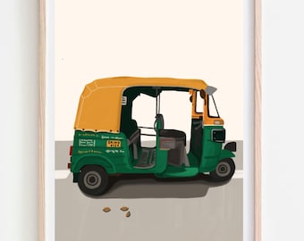 May include: A framed illustration of a green and yellow auto rickshaw, or tuk-tuk, parked on a grey surface. The vehicle features a yellow canopy and green body with the text "OKIND 9184". The artwork is presented in a light wood frame.