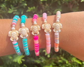 Pack de pulseras de arcilla con tortuga y pulsera de perlas