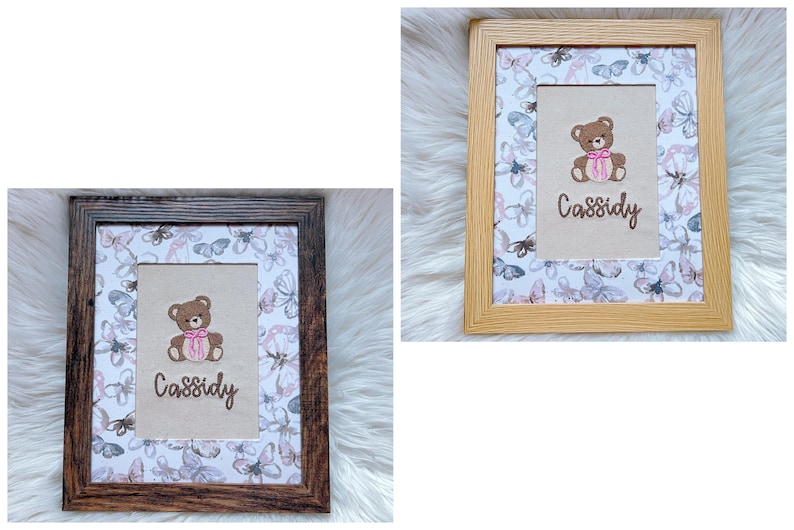May include: Two framed pictures with a teddy bear design. The bear is brown with a pink bow and the name "Cassidy" is written below. The background features a butterfly pattern. One frame is light brown, the other is dark brown.