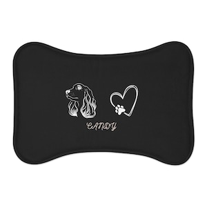 May include: Black pillow with a white silhouette of a dog, a heart with a paw print, and the name "CANDY" in pink.