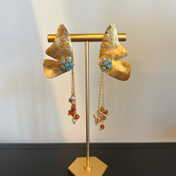 Get a fresh look with handmade 18k Gold Plated butterfly hammered earrings, set with turquoise stones and dangling stones in chains.