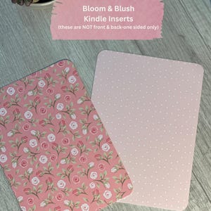 May include: Two Kindle inserts. One has a pink floral pattern with roses and green leaves. The other is a solid light pink with white polka dots. Text on the image reads "Bloom & Blush Kindle Inserts (these are NOT front & back-one sided only)".