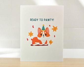 May include: A white card with the text "Ready to Pawty!" in teal blue. A cartoon corgi wearing a party hat is in the center of the card. The corgi is orange and white with a happy expression. There are confetti and stars in the background.