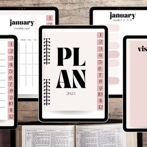 May include: Five digital planner pages with a pink and white color scheme. The pages include a monthly calendar, a weekly planner, a vision board, a notes page, and a page with the word "PLAN" and the year 2023.