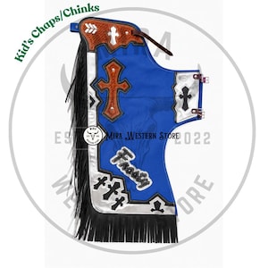 May include: Blue leather chaps featuring a large brown cross appliqué, silver trim, and black fringe along the side. The chaps include decorative cross cutouts, a brown leather top section with arrow patterns, and the word Frosty in white lettering.