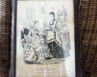 Antique French magazine fashion print in a wooden frame