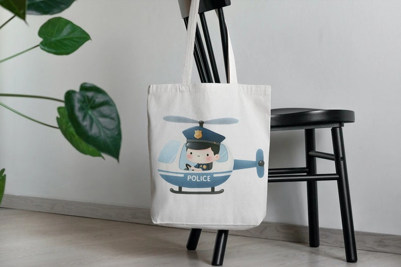 May include: White canvas tote bag with a blue and white illustration of a police officer in a helicopter. The helicopter has the word "POLICE" printed on the side.