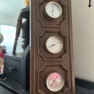 Kitsch Plastic Faux Wood Thermometer, Barometer and Humidity Dials.
