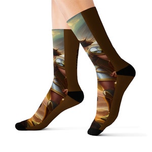 May include: A pair of knee-high socks featuring a warrior design. The socks have a brown background with a detailed illustration of a warrior in armor. The toes and heels are black.