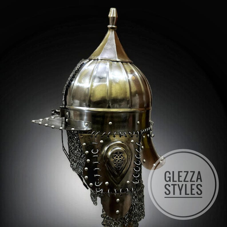 May include: A metallic, antique-style helmet with a rounded top and a pointed finial. The helmet features a visor, chainmail, and decorative rivets. The image includes the text "GLEZZA STYLES" in a circular logo.