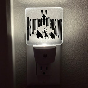 Haunted Ghost Inspired Plug-in LED Night Light with Dusk-Dawn Sensor