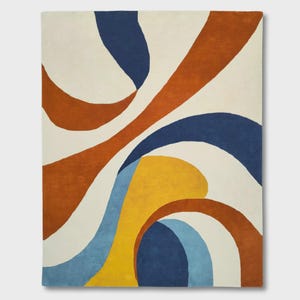 May include: A rectangular area rug featuring a large-scale abstract pattern of sweeping, curved shapes. The design consists of bold, solid color blocks in deep navy blue, burnt orange, mustard yellow, and light blue against a cream-colored background.