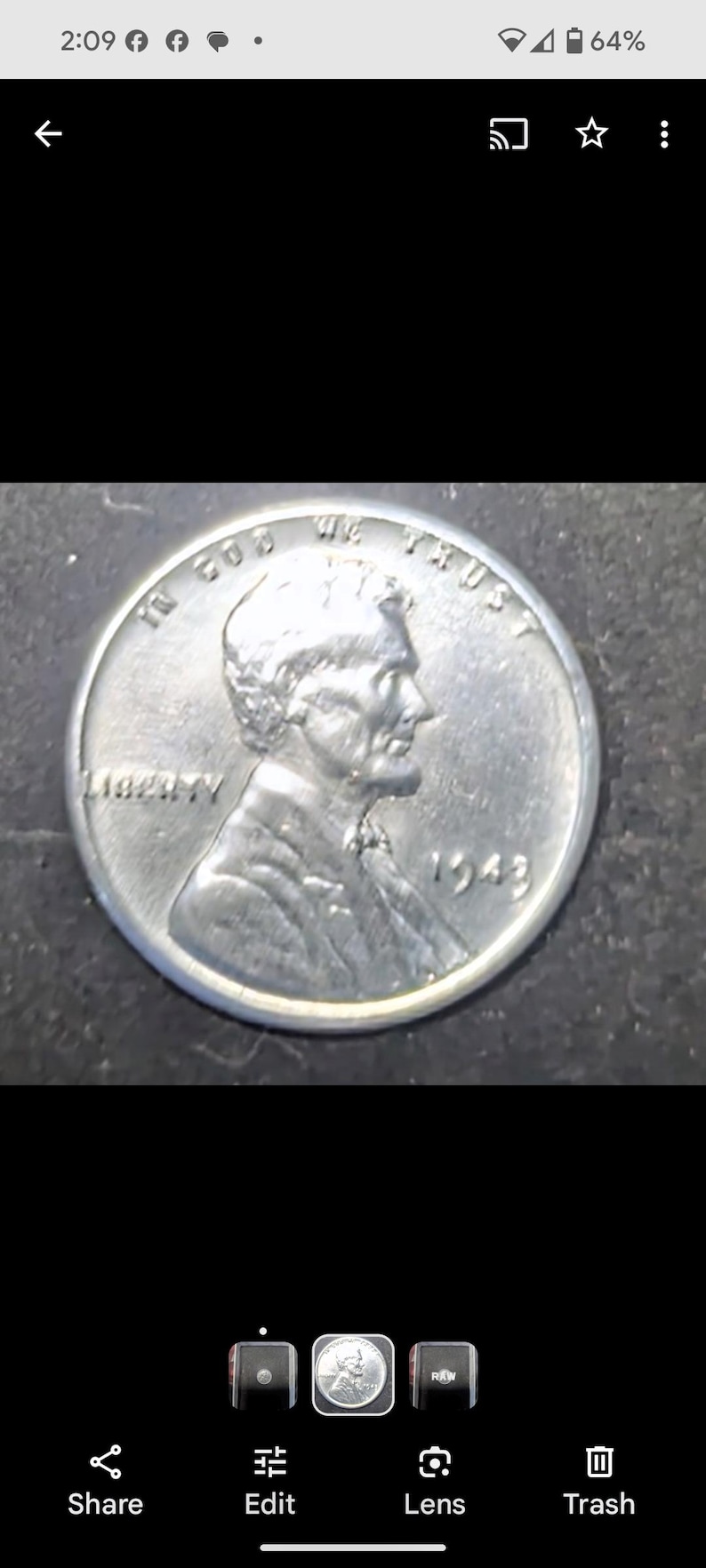 May include: A close-up of a silver 1943 Lincoln penny. The coin features a profile of Abraham Lincoln and the words "In God We Trust" and "Liberty". The year "1943" is visible.