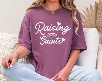Raising Little Saints Shirt, Catholic Mom Shirt, Christian Motherhood Tee, Faith Mom Gift, Religious Shirt for Women