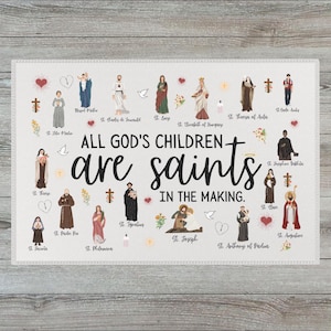 May include: A rectangular decorative print featuring illustrations of various saints, with the text "ALL GOD'S CHILDREN are saints IN THE MAKING." The print includes images of crosses, hearts, and doves, with each saint's name below their image.