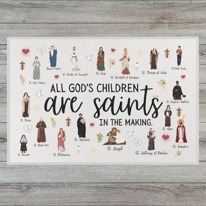 May include: A rectangular decorative print featuring illustrations of various saints, with the text "ALL GOD'S CHILDREN are saints IN THE MAKING." The print includes images of crosses, hearts, and doves, with each saint's name below their image.