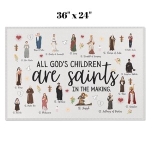 May include: A rectangular decorative rug, measuring 36" x 24", features illustrations of saints and the text "ALL GOD'S CHILDREN are saints IN THE MAKING." The rug has a light-colored background with a border.