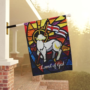 May include: A stained glass style flag with a white lamb standing on a red, yellow, and blue background. The lamb is holding a staff with a banner that reads "Lamb of God".