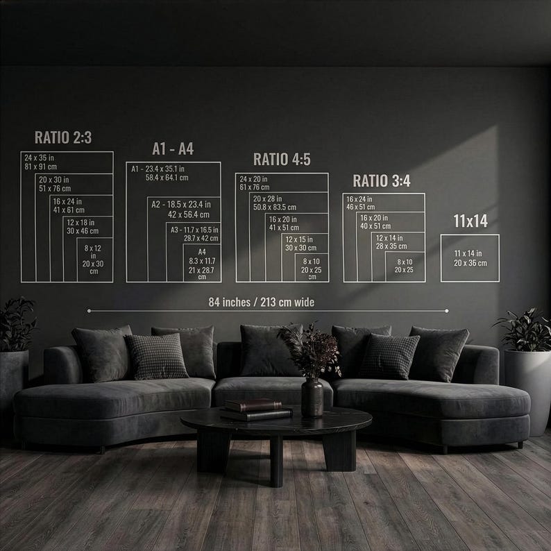 May include: A dark gray living room with a sectional sofa, coffee table, and wall art. The wall art displays size ratios and dimensions in inches and centimeters. The text on the wall reads "RATIO 2:3", "A1-A4", "RATIO 4:5", "RATIO 3:4", and "11x14". The text also reads "84 inches / 213 cm wide".